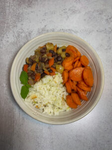 Bowl of rice, beans and carrots