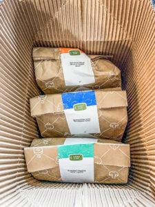 3 paper bags in a box