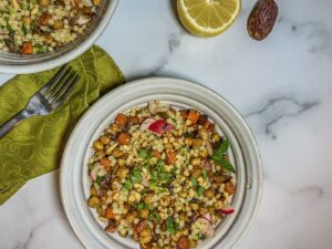 Top down view of bowl with couscous and veggies