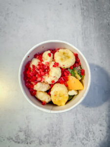 Cup full of frozen fruit and veggies