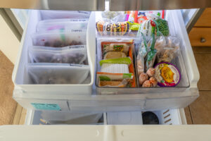 Freezer drawer filled with food