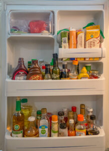 Door of refrigerator full of food