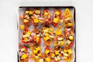 Cookie sheet full of mini pepper nachos