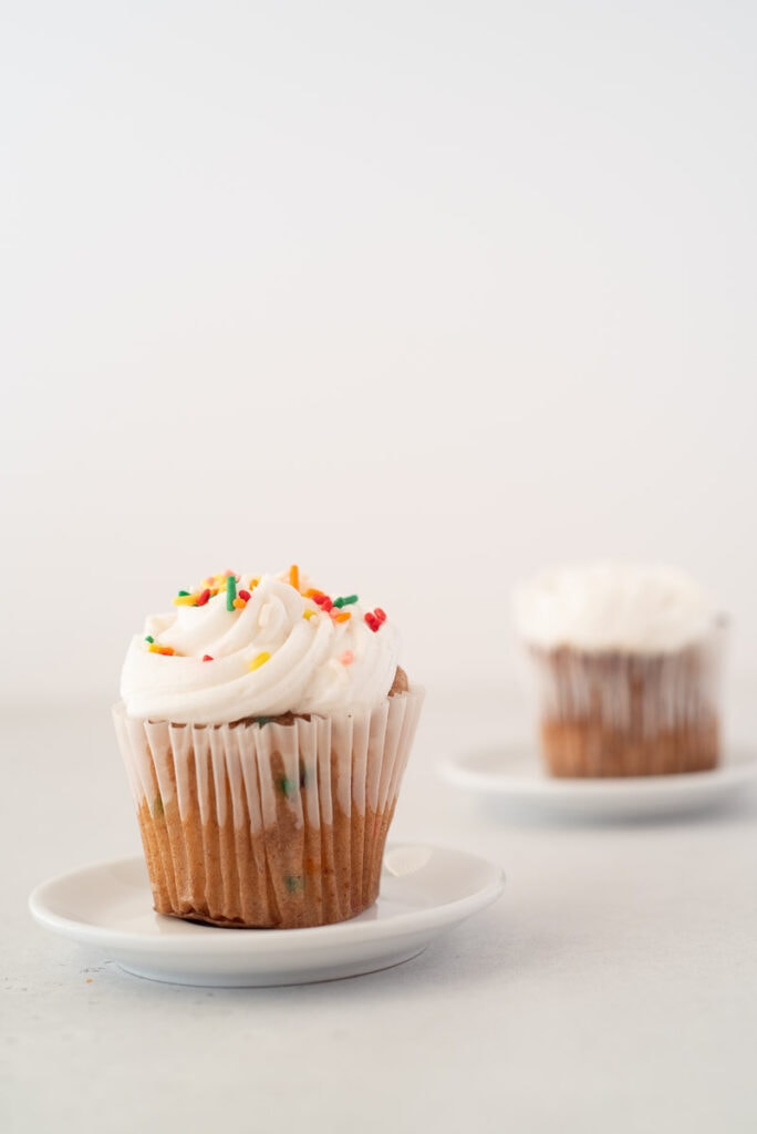 Two cupcakes on plates