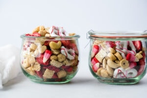 Two jars full of Valentine snack mix