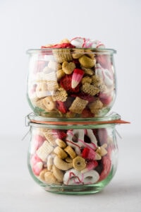 Two Weck jars full of snack mix stacked