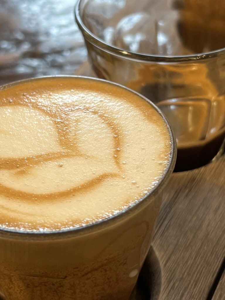 Close up of a macchiato in a small glass