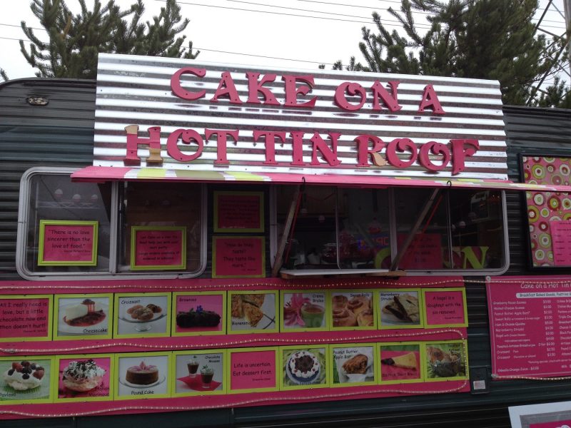 A food cart that sells cake