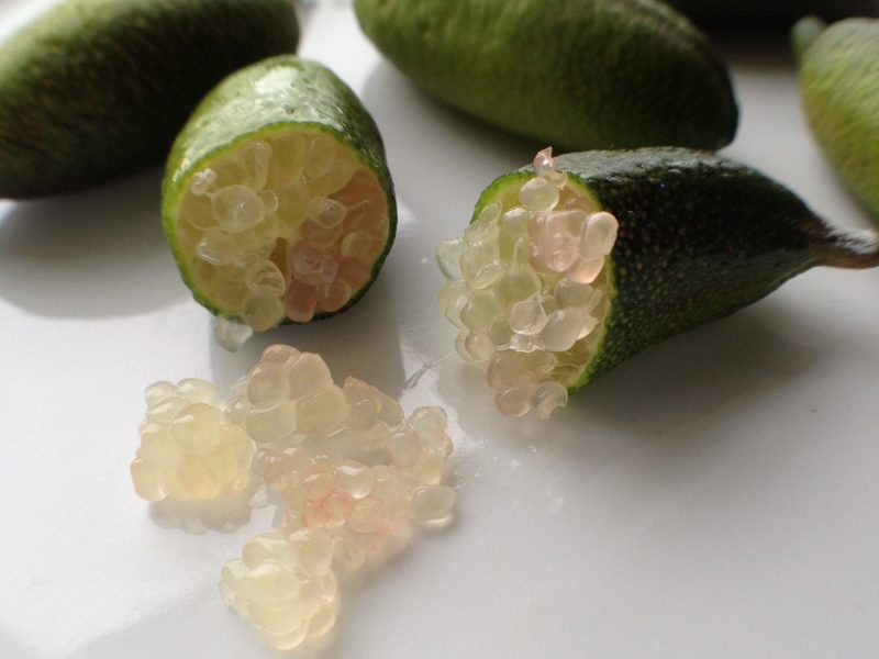 Finger limes cut open to reveal inside