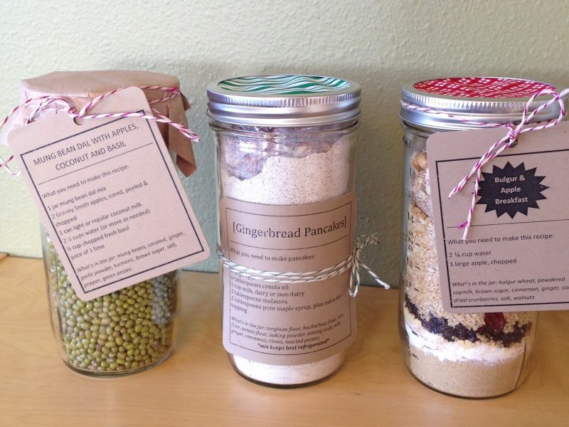 3 canning jars filled with ingredients and tied with recipe cards