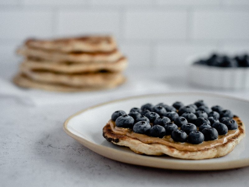 Naan bread with peanut butter and blueberries